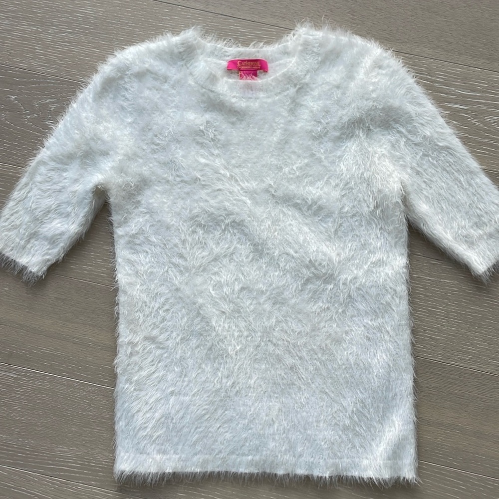 Fuzzy white three quarter sleeve shirt